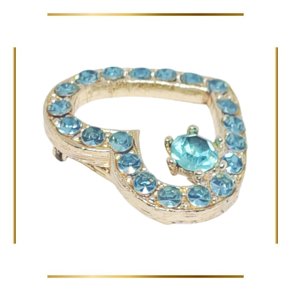 Gold Tone Heart Shaped Brooch with Blue Rhinestones